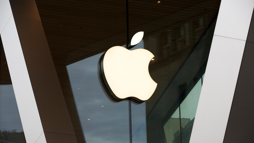 An Apple company logo on a storefront