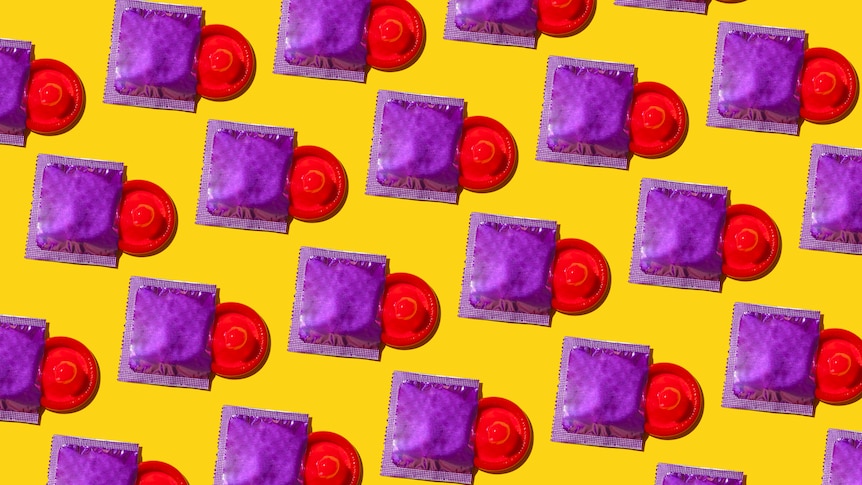 Multiple condoms in purple packets against a yellow background