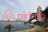 Sydney, with the Airbnb logo superimposed over it