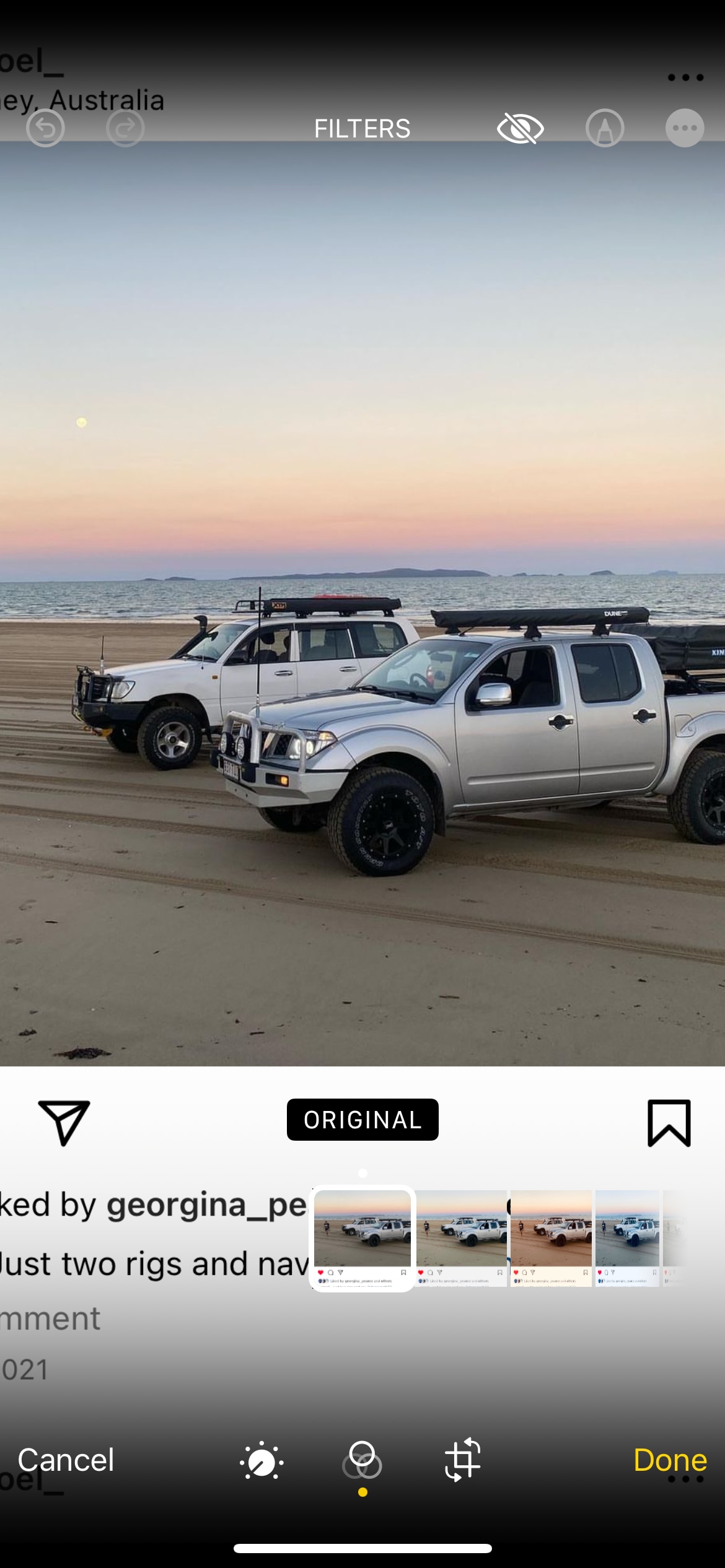 4WD vehicles on a beach.