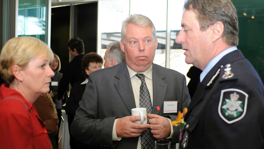 AFP commissioner Mick Keelty (right) speaks to Bruce and Denise Morcombe during Missing Persons Week, 2008.