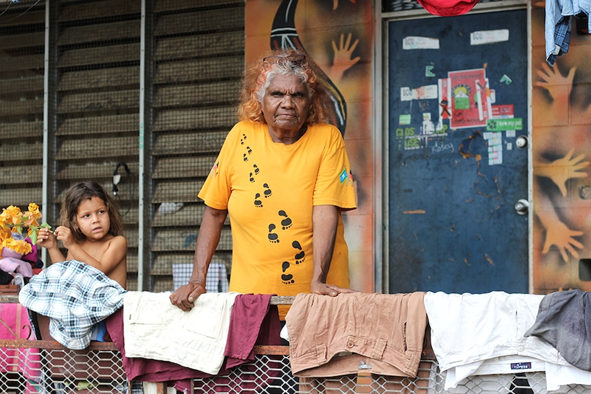 Bagot resident Helen Fejo-Frith stands on a verandah.