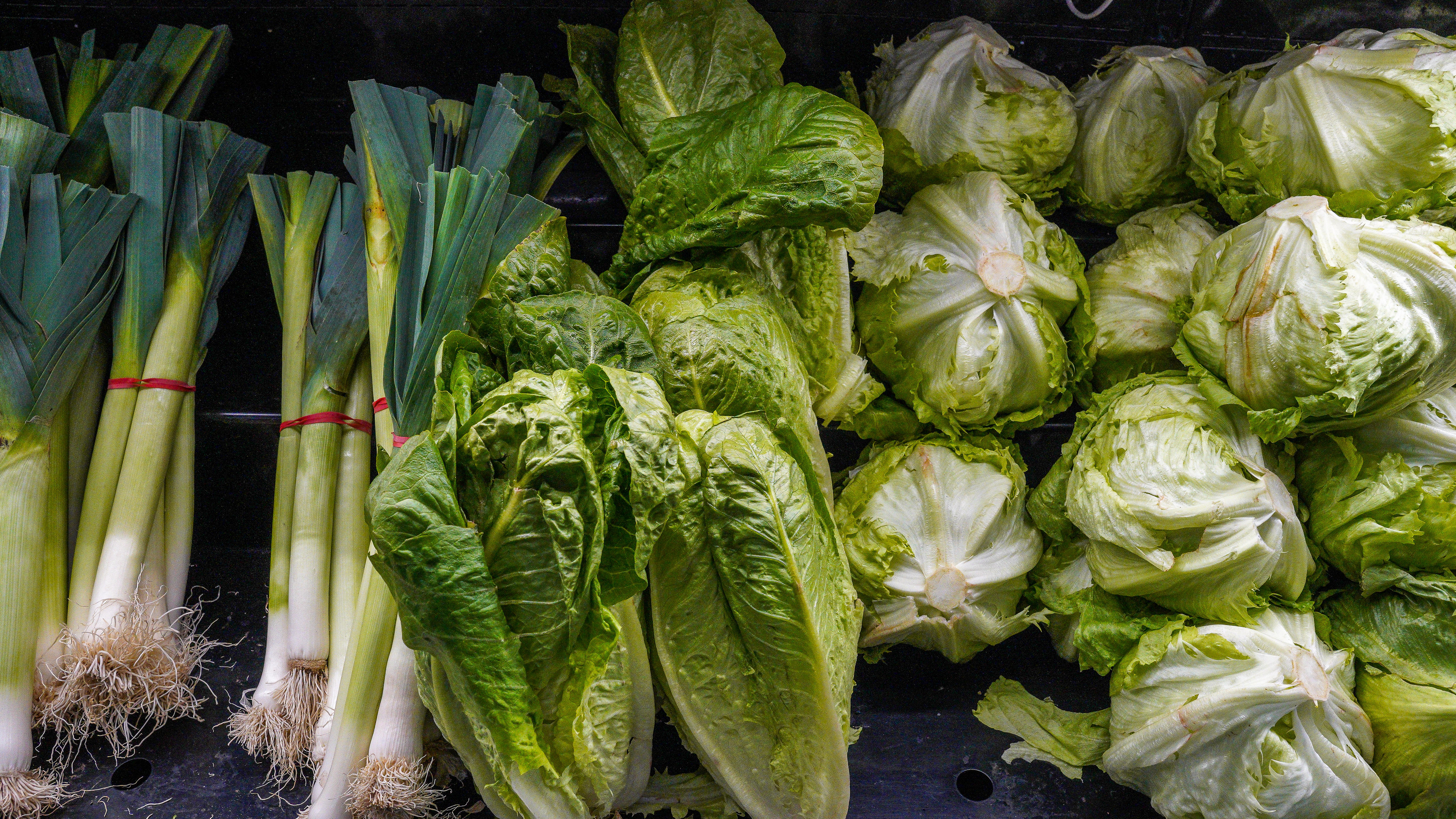 Vegetable display, leek, lettuce, fresh produce grocery display