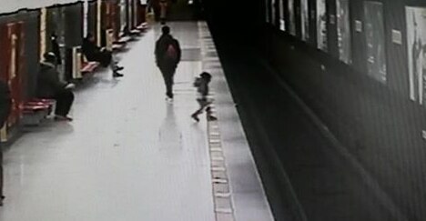 Toddler rescued from train tracks by quick-acting student in busy Milan ...