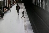 CCTV footage shows The moment a toddler approaches the train tracks in Milan's Repubblica station.