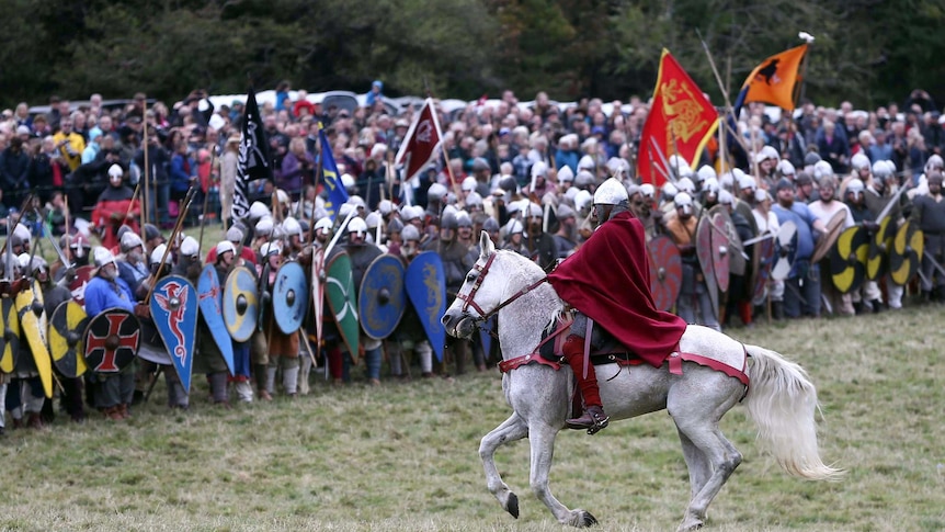 Re-enactors participate in a re-enactment of the Battle of Hastings