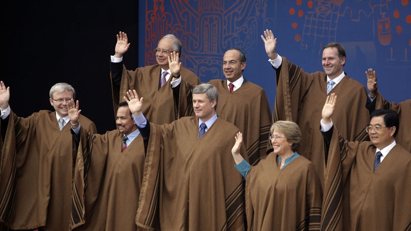 Kevin Rudd joins other world leaders in his APEC poncho