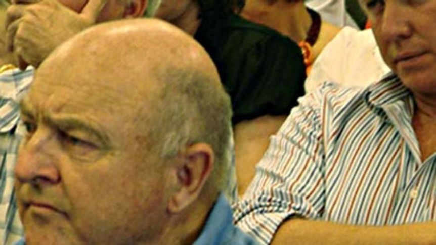 National Farmers Federation (NFF) president David Crombie (left) and farmer Hamish McIntyre listen at the Murray Darling Basin Commission (MDBC) briefing in St George, southern Queensland.