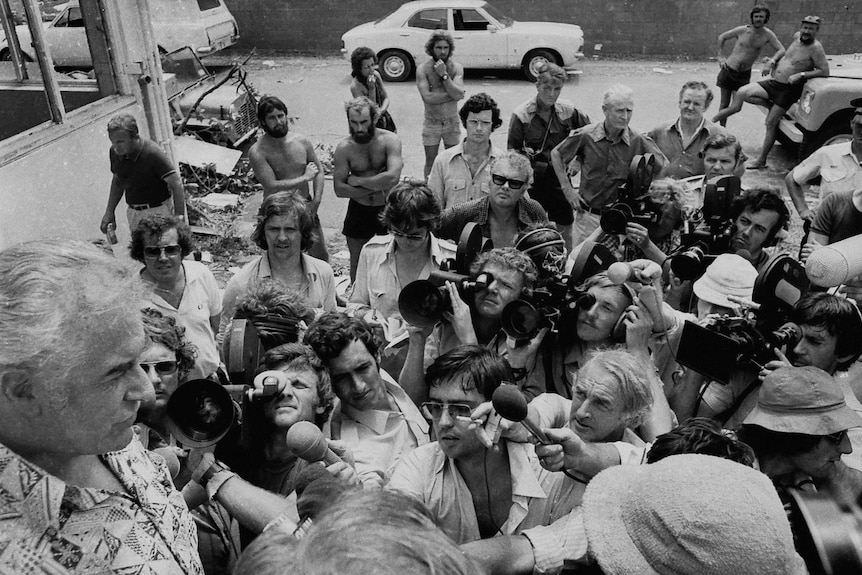 Then Prime Minister Gough Whitlam speaks to newsmedia in Darwin after Cyclone Tracy in 1974