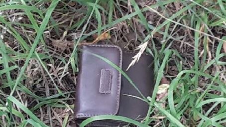Brown wallet police found in Fisher laneway