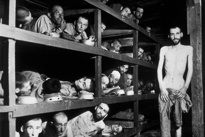 Elie Wiesel is pictured among a group of men in Buchenwald concentration camp.