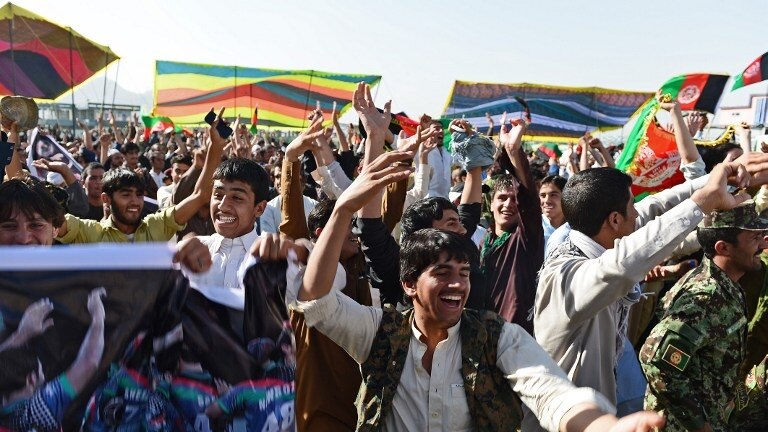 Fans celebrate as the Afghani cricket team qualifies for their first World Cup