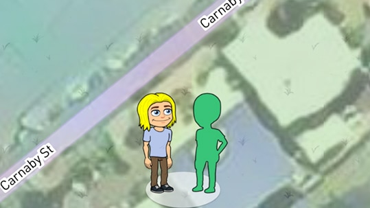 Street name on a map with two bitmojis on top of a building showing the exact location of the Snapchat users