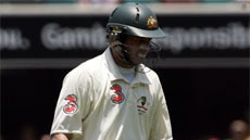 Michael Hussey is dismissed in the first Ashes Test at the Gabba.