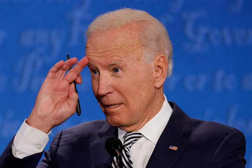 Democratic presidential nominee Joe Biden gestures as he participates in the first 2020 presidential campaign debate