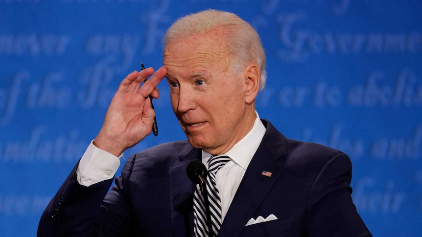 Democratic presidential nominee Joe Biden gestures as he participates in the first 2020 presidential campaign debate