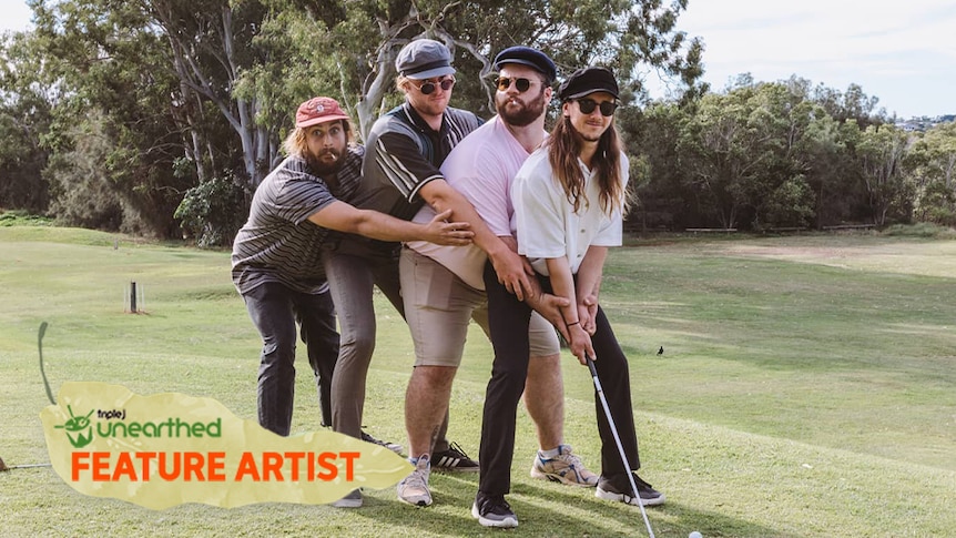 The four members of Beddy Rays stand on a golf course with arms around each other holding a golf club.