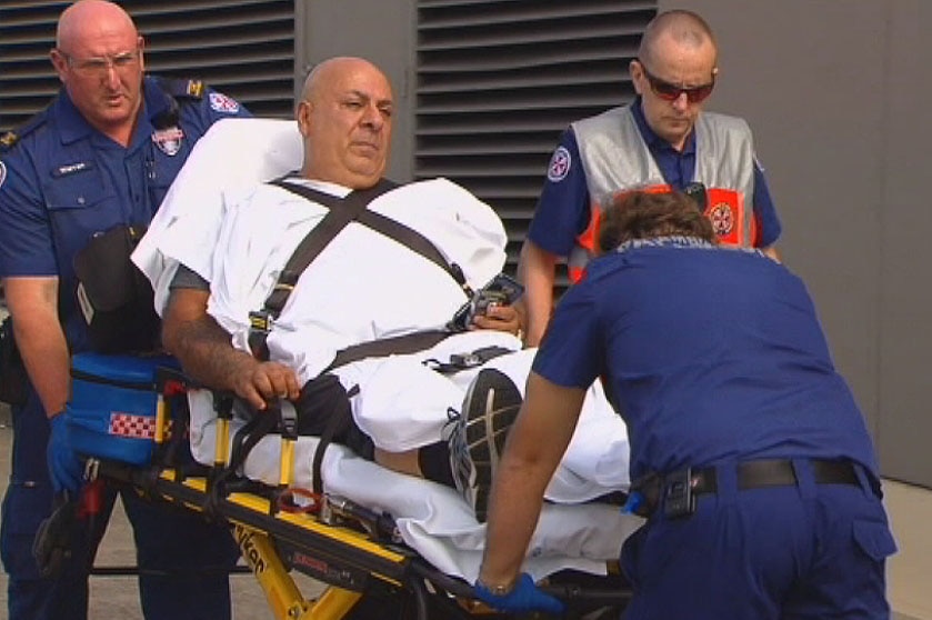 Injured man taken away from scene of Bankstown shooting