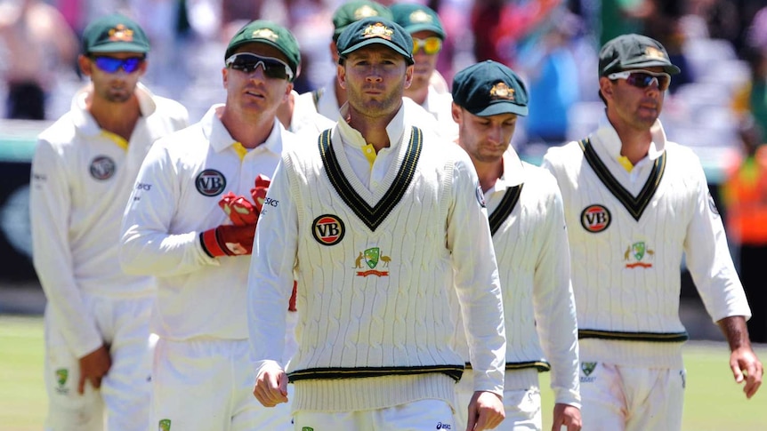 Michael Clarke leads his players off the field in Cape Town. (Gallo Images via Getty Images: Lee Warren)