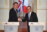 David Cameron shakes hands with Francois Hollande after talks in Paris