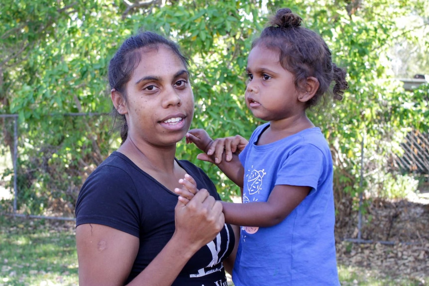 Kadjahna Skinner with her daughter in the remote Aboriginal community Looma.
