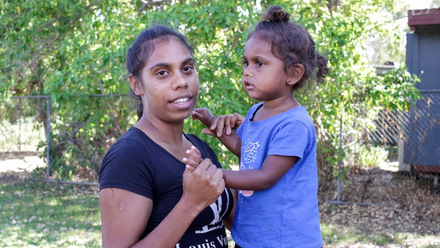 Kadjahna Skinner with her daughter in the remote Aboriginal community Looma.