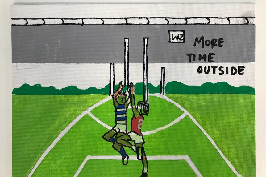 A painting of a football field with goal posts and two players. The words "more time outside" are painted on one side.