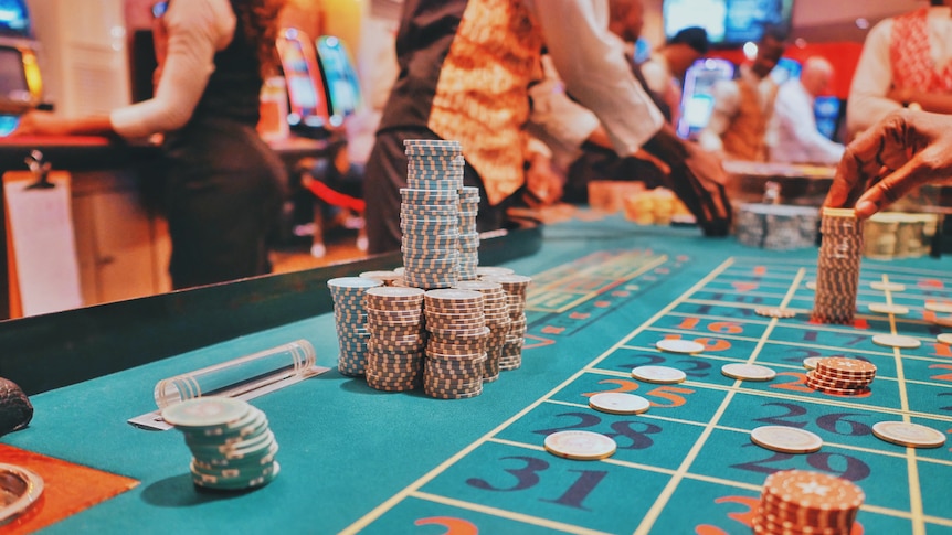 Chips on the board of a roulette table at a casino