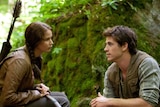 Jennifer Lawrence and Liam Hemsworth in a scene from The Hunger Games (Lionsgate/Murray Close)