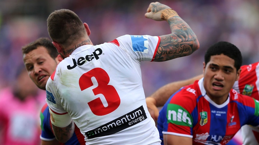 Newcastle's Tyrone Roberts and the Dragons' Josh Dugan in an altercation at Hunter Stadium.