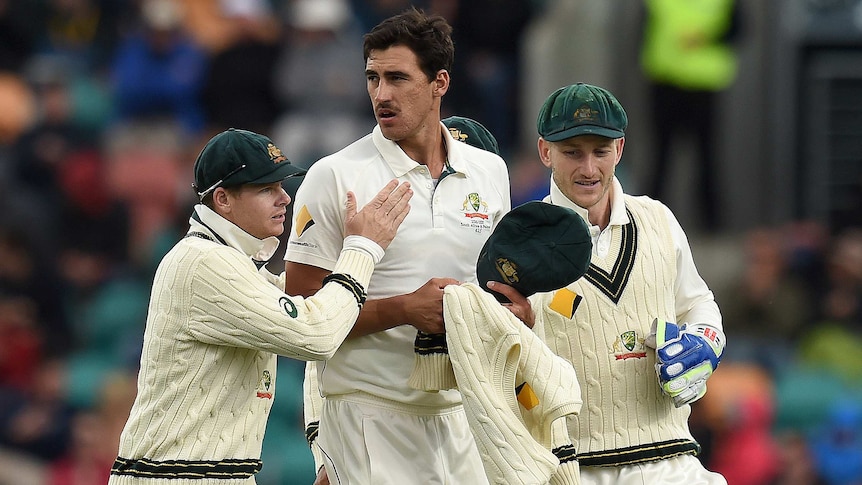 Mitchell Starc is congratulated for his wickets