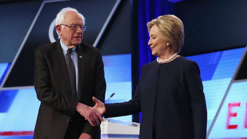 Bernie Sanders and Hillary Clinton shake hands at Florida debate