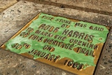 A footpath plaque commemorating Rolf Harris is pictured near the family's former residence on Bassendean Parade.