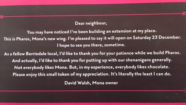The rear inscription of David Walsh's chocolate bar apologises to Berridale residents