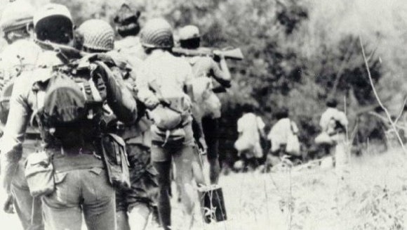 Indonesian troops on the march in East Timor, 1975