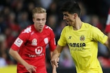 Villarreal's Gerard looks to pass the ball between