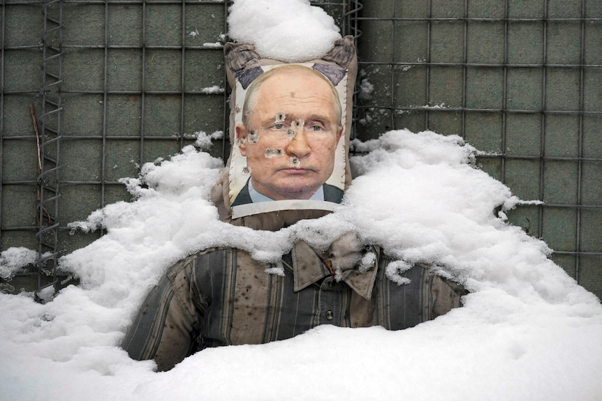 A bullet riddled effigy of Russian President Vladimir Putin