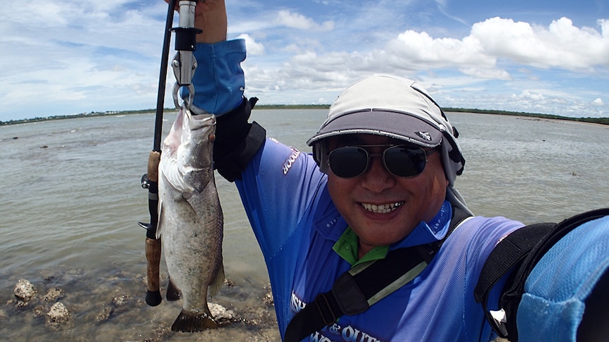 Fisherman Hiroaki Nakamura who has caught 1000 barramundi
