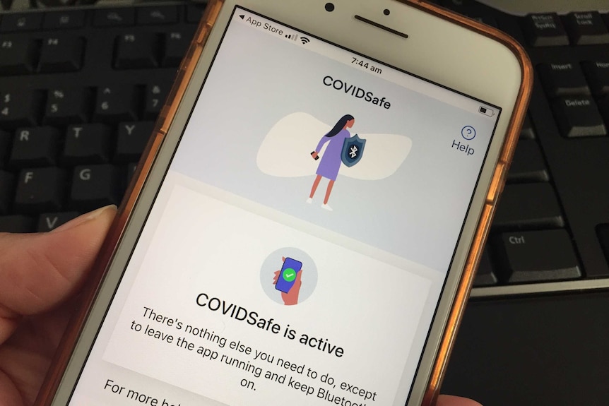 a phone with the COVIDSafe app open on it. Screen says COVIDSafe is active