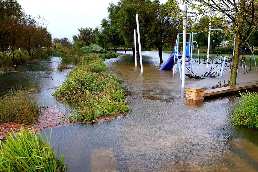 A playground swamped by water