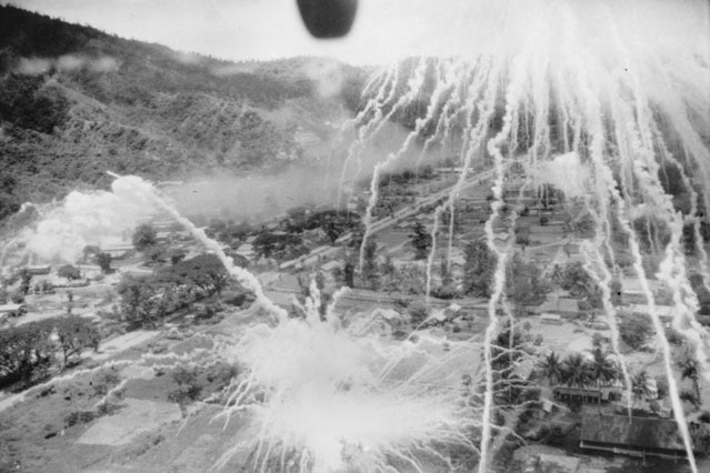 Black and white photo of Rabaul bombing raid.