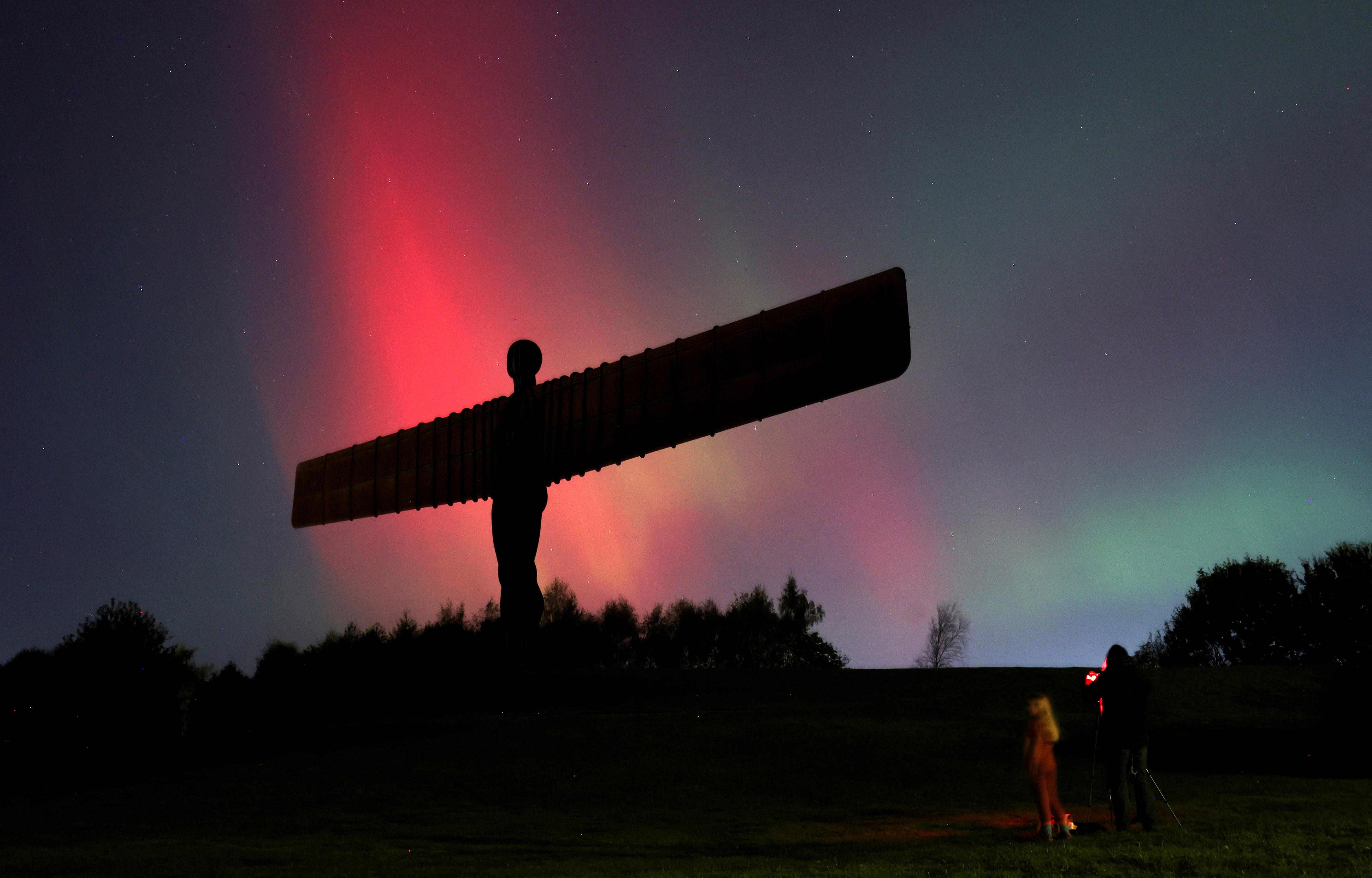 Northern Lights, also known as aurora borealis, are seen at the Angel of the North in Gateshead, Britain