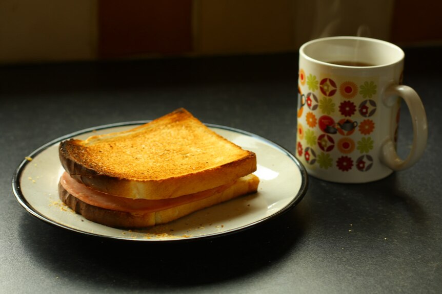 A hot tea and buttery toast.