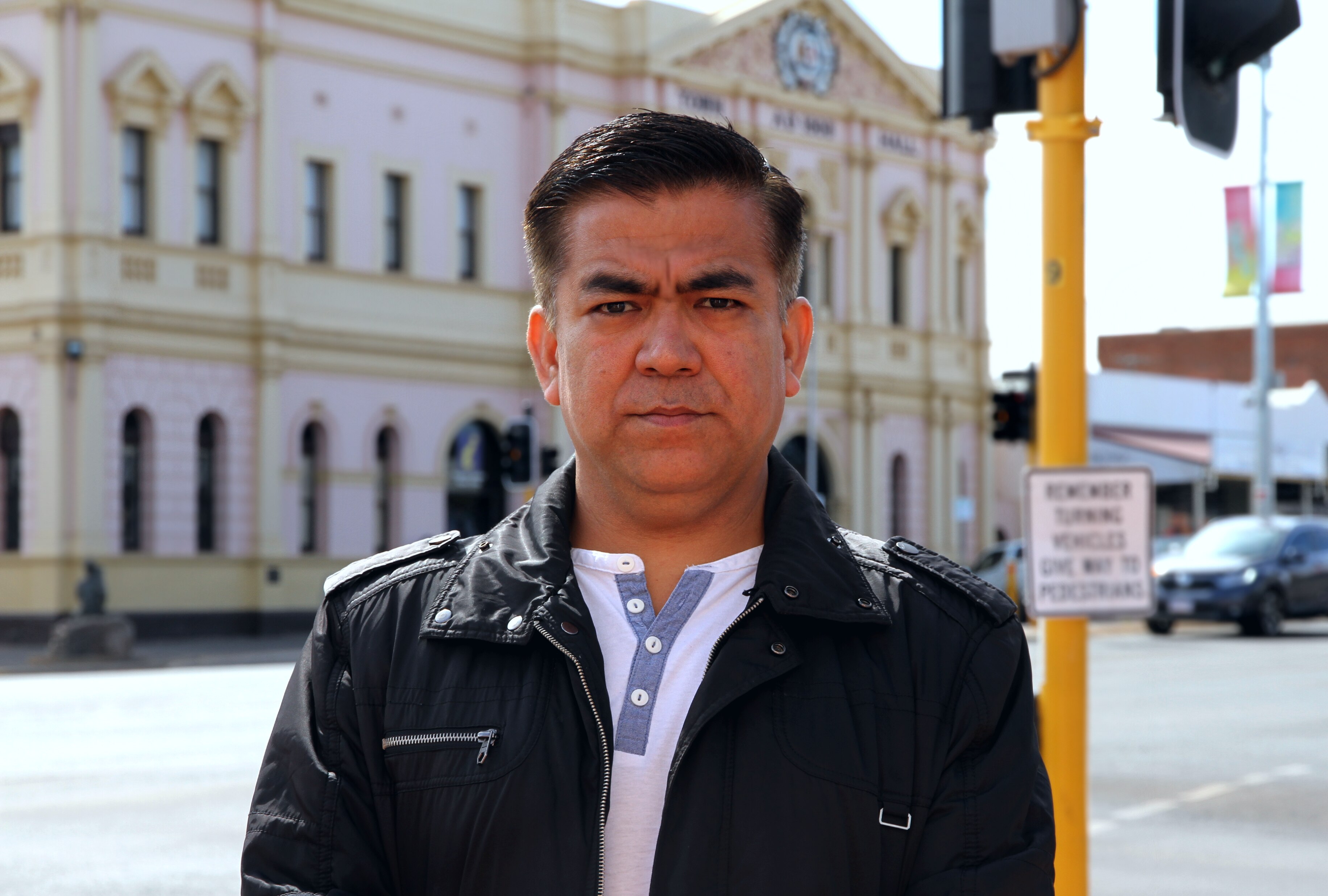 Sam Hussain stands in front of the Kalgoorlie Town Hall