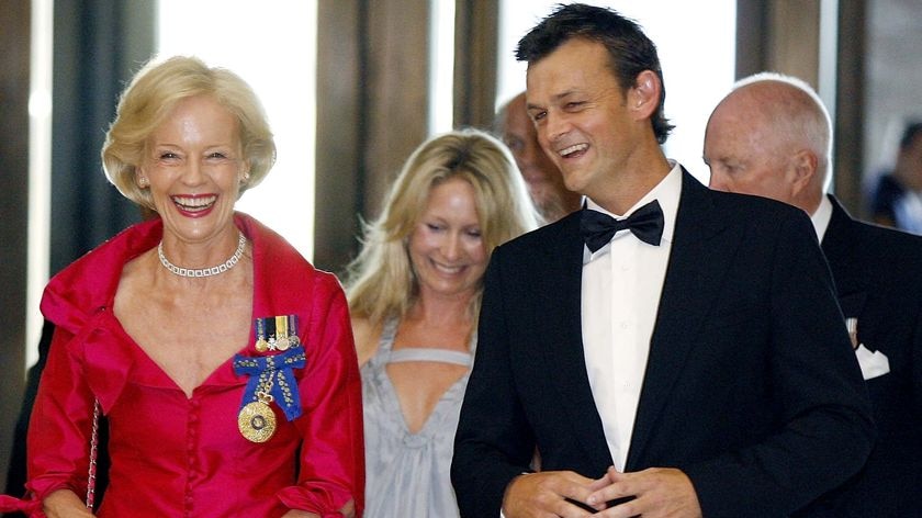 Adam Gilchrist with Governor-General Quentin Bryce (AAP: Stefan Postles)