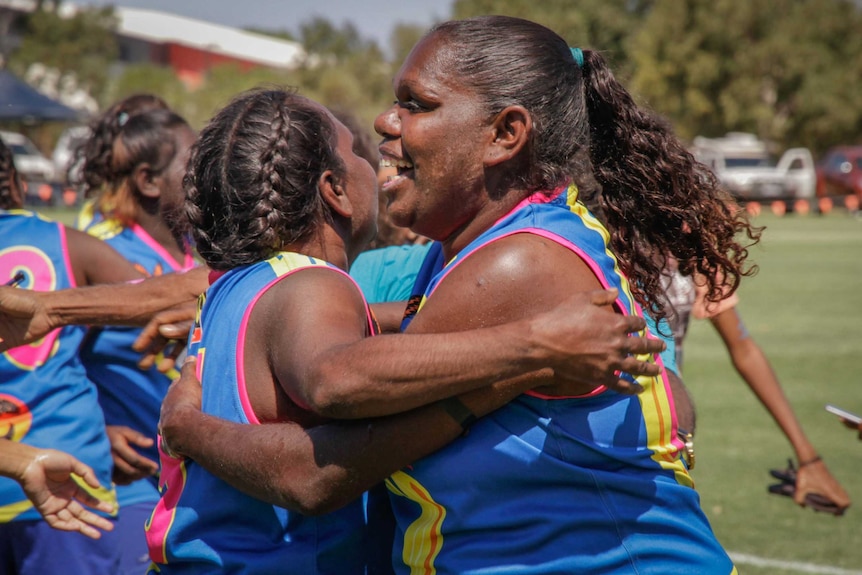 The Looma Eagles celebrate after winning the first Women's West Kimberley Football League grand final