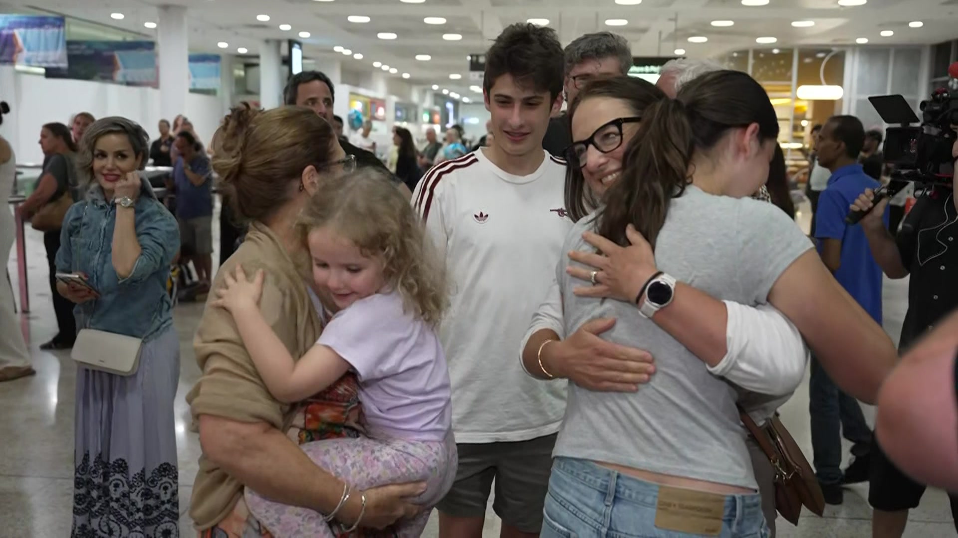 'Overjoyed': Emotions run high as first flight out of Middle East lands in Sydney