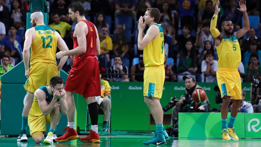 Patty Mills is called for a foul in the dying seconds of the bronze-medal basketball match at Rio 2016