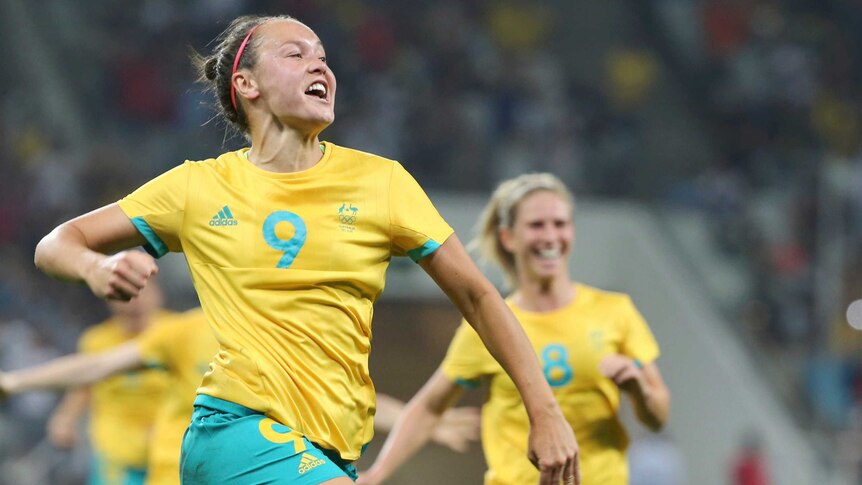 Caitlin Foord celebrates a goal against Germany