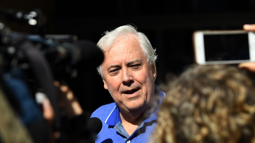 Businessman and former federal MP Clive Palmer speaks to the media